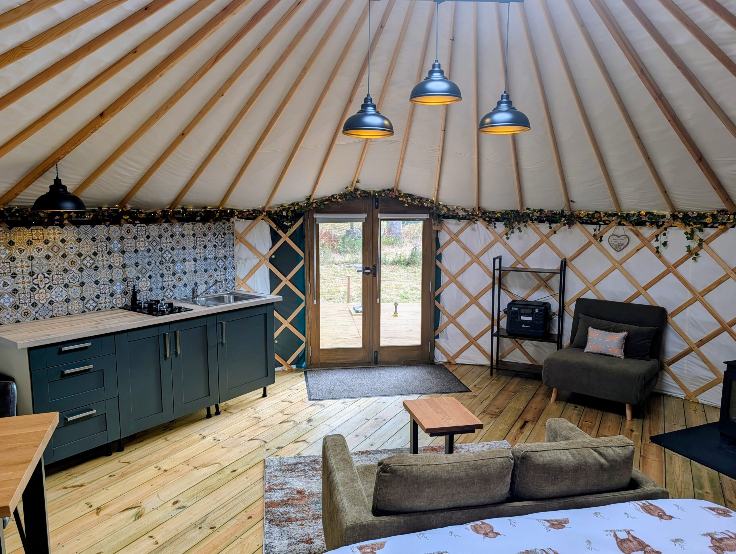 XL yurts have french windows which open onto the large decking area.